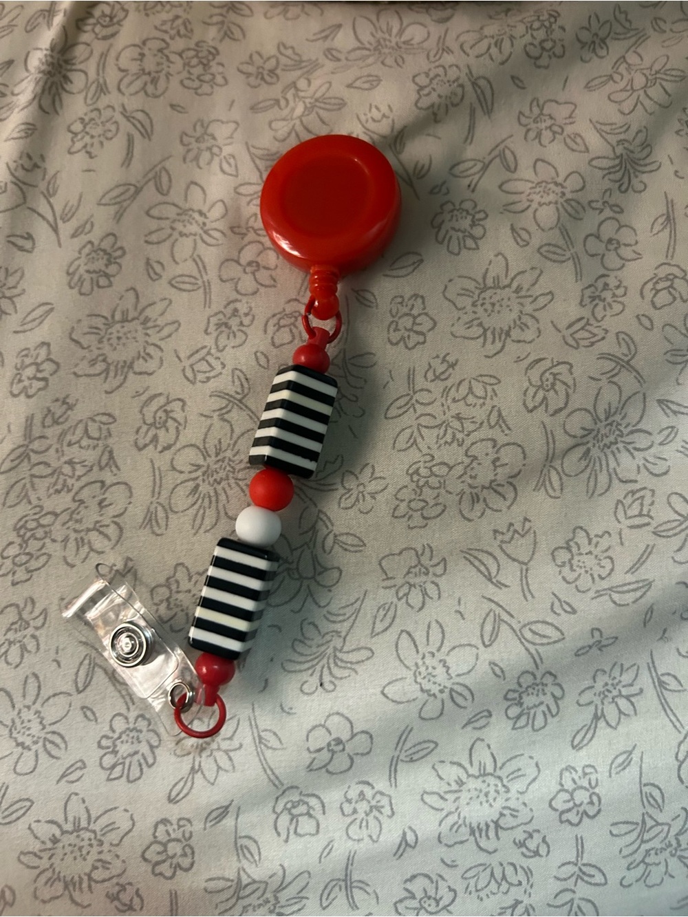 Red Beaded Badge Reel with Black & White Accents